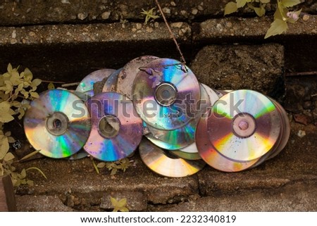 infrared image of the many copies of trash and dirty compact disc in the drain
