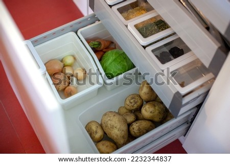 Storing vegetables in the kitchen. Storage organization.