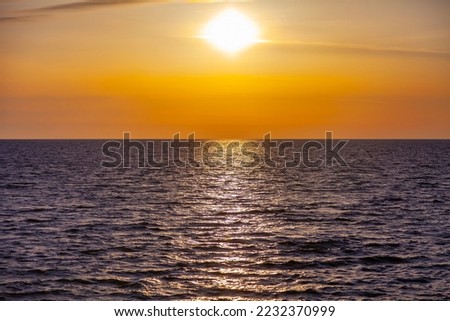 Scenic sunset sea landscape. Surfline with waves and horizon