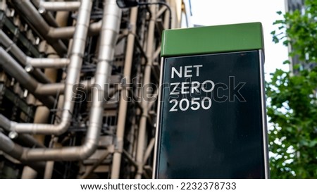 Net Zero 2050 on a sign in front of an Industrial building Royalty-Free Stock Photo #2232378733