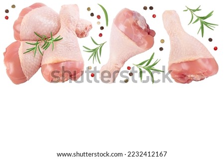 Raw chicken leg or drumstick isolated on white background with full depth of field. Top view with copy space for your text. Flat lay Royalty-Free Stock Photo #2232412167