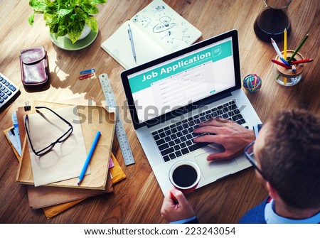 Man Applying for a Job on the Internet Royalty-Free Stock Photo #223243054