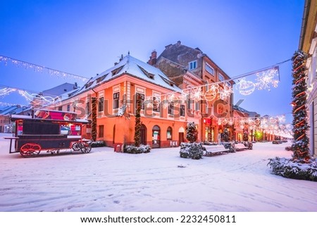 Brasov, Romania. Christmas decorations in downtown, winter season landscape, Transylvania in Eastern Europe.