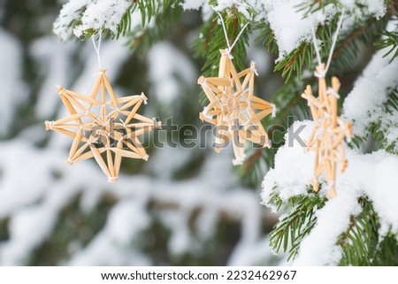 POSTCARD of Christmas and New Year decorations: fir branches IN THE SNOW, Christmas tree decorations HANDMADE FROM STRAW