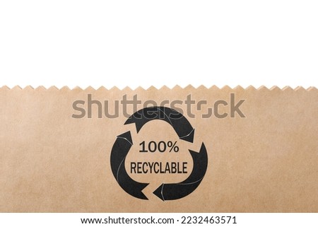 Paper bag with recycling symbol on white background. Eco friendly package