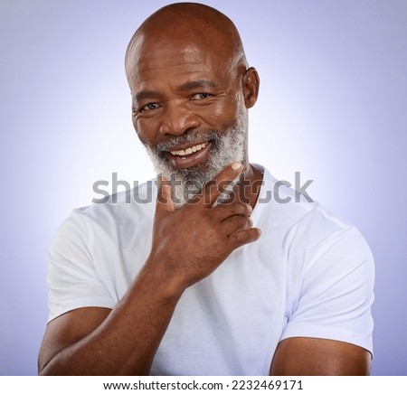 Studio portrait of happy senior black man with smile, confident face and standing on studio background. Fashion, retirement and profile picture of trendy old man from Nigeria, male model from Africa.