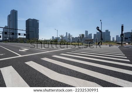 empty asphalt road in city