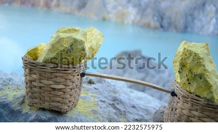 Basket full of sulfur carried from the crater lake to the top of the mountain