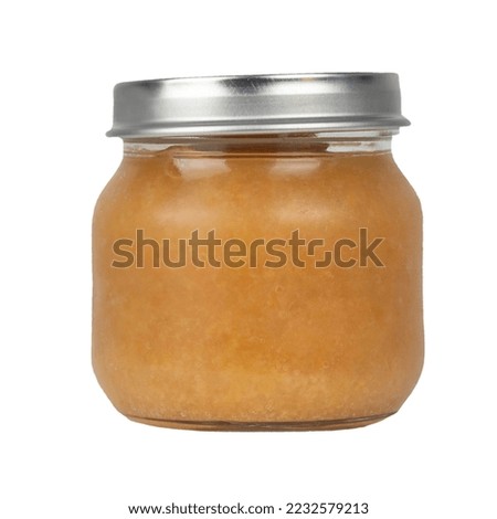 Glass jar with metal lid baby food applesauce Royalty-Free Stock Photo #2232579213