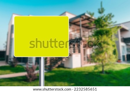 Blank yellow Sign on home background.