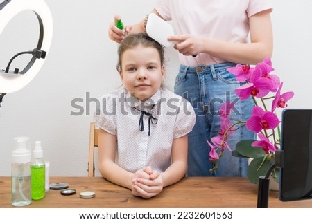 young girl blogger preparing to shoot a video