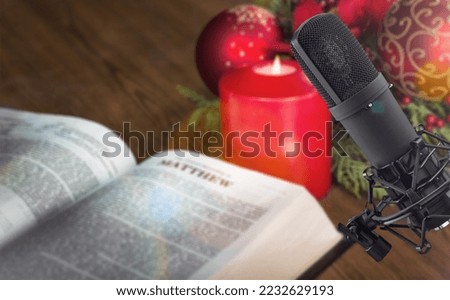 Christian concept. Bible book with microphone