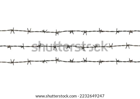 rusty barbed wire isolated from a lantern Royalty-Free Stock Photo #2232649247