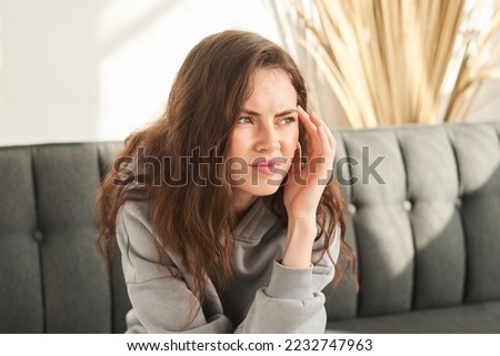 sad woman concept of negative emotions and experiences, dissatisfaction with life, negative thoughts about climate change Royalty-Free Stock Photo #2232747963