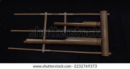 This musical instrument is called Angklung, which is played by shaking. Musical instrument from Indonesia March 25, 2006 (original upload date)