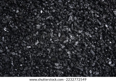 Fuel for furnace heating - hard coal. Pile of natural black hard coal for texture background. Best grade of metallurgical anthracite coals often referred to as stone coal and black diamond coal Royalty-Free Stock Photo #2232772549