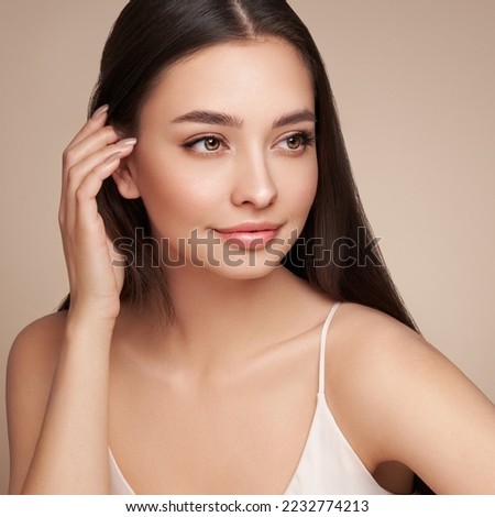 Portrait beautiful young woman with clean fresh skin. Model with healthy skin, close up portrait. Cosmetology, beauty and spa Royalty-Free Stock Photo #2232774213