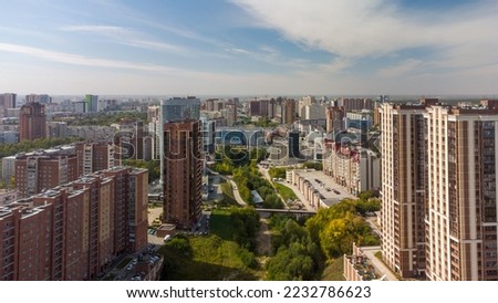 Multi-storey residential buildings in the center of Novosibirsk from a height. Urban landscape. Construction of houses. Architecture. Photographs of the city of Novosibirsk from a height, aerial photo