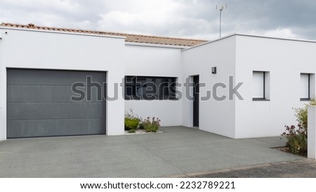 modern new house cubic front door entrance of home building Royalty-Free Stock Photo #2232789221