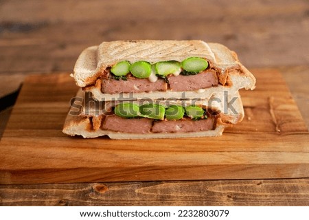 Hot Sandwich with Asparagus and Luncheon Meat Royalty-Free Stock Photo #2232803079