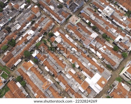 Abstract Defocused Blurred Background aerial view of neatly arranged residents' houses in the Cikancung area - Indonesia. Not Focus