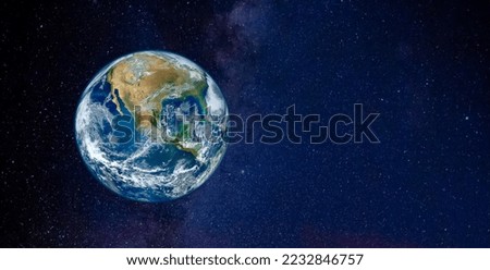 Planet Earth in the space. Millions of stars in the background. Space, sci-fi background photo with copy space for text. Elements of this image furnished by NASA.