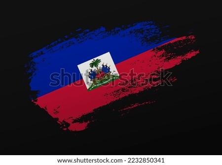 Abstract creative patriotic hand painted stain brush flag of Haiti on black background