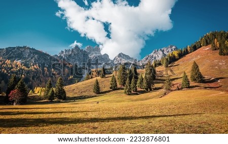 Splendid Alpine scenery. Fantastic mountain highland in sunny day. Amazing Autumn background. Landscape of nature with sunlight. Filzmoos, Salzburg, Austria. Picture of wild area.