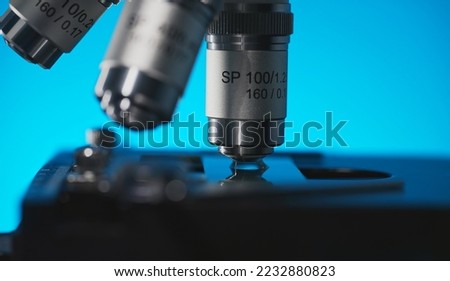 Macro view of Microscope and slide. Science and Healthcare Technology.