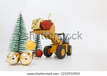 Christmas ornament with  Wheel Loader model , Holiday celebration concept new year on white backgrounds.