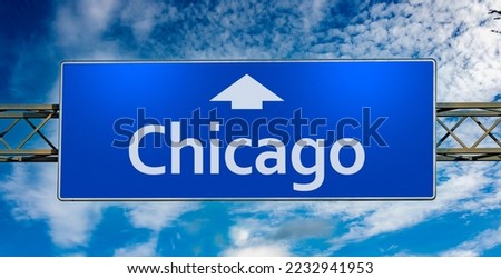 Road sign indicating direction to the city of Chicago.