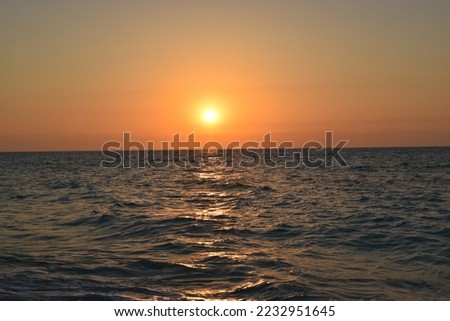 Sunset on the vast sea