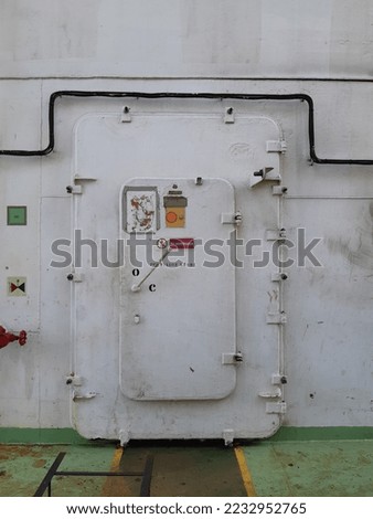 Weathertight door of provision store of tanker ship, tanker vessel. Royalty-Free Stock Photo #2232952765