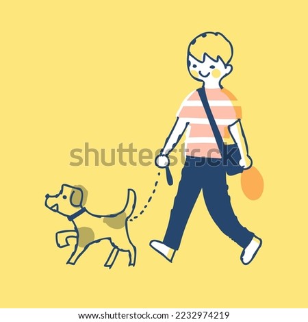 Boy walking a dog with a smile