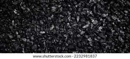 Fuel for furnace heating - hard coal. Pile of natural black hard coal for texture background. Best grade of metallurgical anthracite coals often referred to as stone coal and black diamond coal. Royalty-Free Stock Photo #2232981837