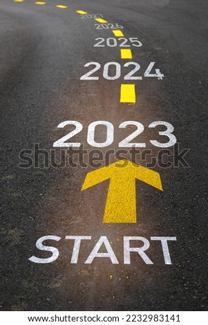 Start to new year from 2023 to 2027 with arrow marking on road. Five years startup business concept and beginning to success idea Royalty-Free Stock Photo #2232983141