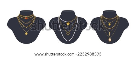Set of trendy minimalistic necklaces, chains, and beads with gold pendants. Jewelry are displayed on black mannequin busts. Vector cartoon objects for fashion and beauty design.  Royalty-Free Stock Photo #2232988593
