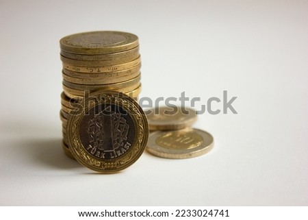 Turkish Money, Turkish Lira Coins. Stack of Turkish Lira coins on white background. Isolated 1 Turkish Lira Coin. Royalty-Free Stock Photo #2233024741
