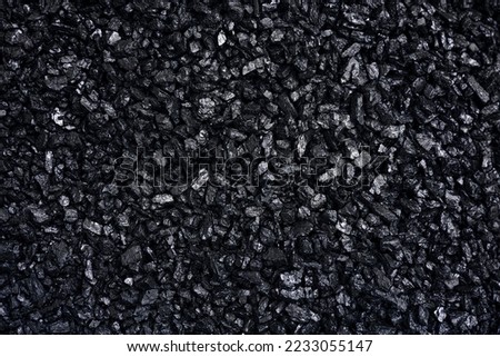 Fuel for furnace heating - hard coal. Pile of natural black hard coal for texture background. Best grade of metallurgical anthracite coals often referred to as stone coal and black diamond coal Royalty-Free Stock Photo #2233055147