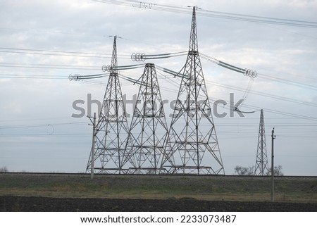 
High-voltage wires against the backdrop of cold weather in Ukraine. Energy and electricity. The threat of de-energized cities. Energy supply of the country. electricity generation Royalty-Free Stock Photo #2233073487