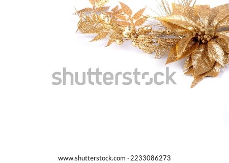 white light christmas card background with golden branches and leaves and fancy gold painted artificial pine cone top corner