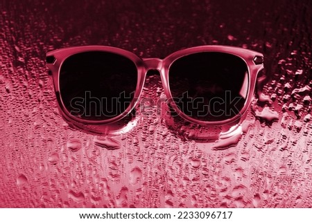 Sunglasses. New 2023 trending PANTONE 18-1750 Viva Magenta color
