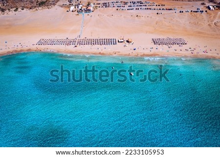 Aerial shot of beautiful turquoise beach Falasarna (Falassarna) in Crete, Greece. View of famous paradise sandy deep turquoise beach of Falasarna (Falassarna) in North West, Crete island, Greece. Royalty-Free Stock Photo #2233105953