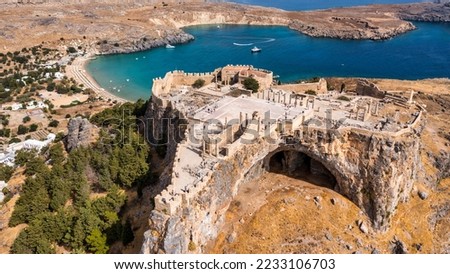 Ruins of Acropolis of Lindos view from above, Rhodes, Dodecanese Islands, Greek Islands, Greece. Acropolis of Lindos, ancient architecture of Rhodes, Greece.  Royalty-Free Stock Photo #2233106703