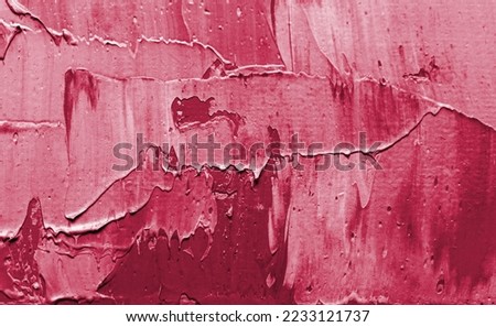Colorful painted canvas as background. New 2023 trending PANTONE 18-1750 Viva Magenta color
