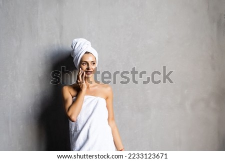Young healthy serene woman girl relaxing in bathrobe and spa towel after having bath shower at home. Beauty treatment, rest and body care procedures. Royalty-Free Stock Photo #2233123671