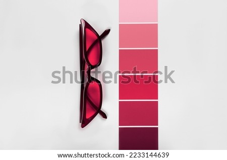 Color samples palette design catalog with sunglasses. New 2023 trending PANTONE 18-1750 Viva Magenta color