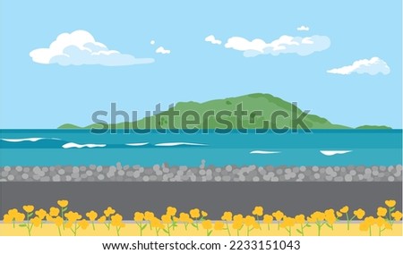 A quiet seaside road with canola flowers. An island can be seen in the distance.