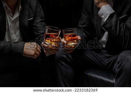 whiskey, for a friendly party in a bar or a restaurant. Royalty-Free Stock Photo #2233182369