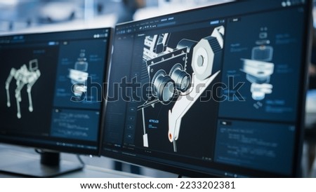 Close Up of a Computer Monitor Screen with 3D CAD Software with High Mobility Robot Dog Project. Interface with Vital Setting and Programming Code for the Industrial Robot Prototype. Royalty-Free Stock Photo #2233202381